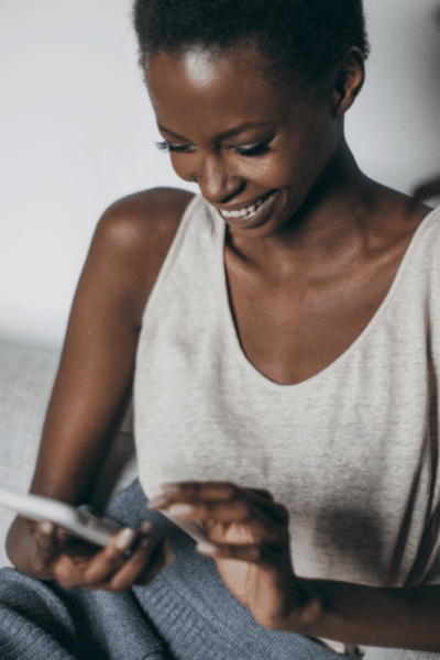 Woman looking for current auto refinance rates